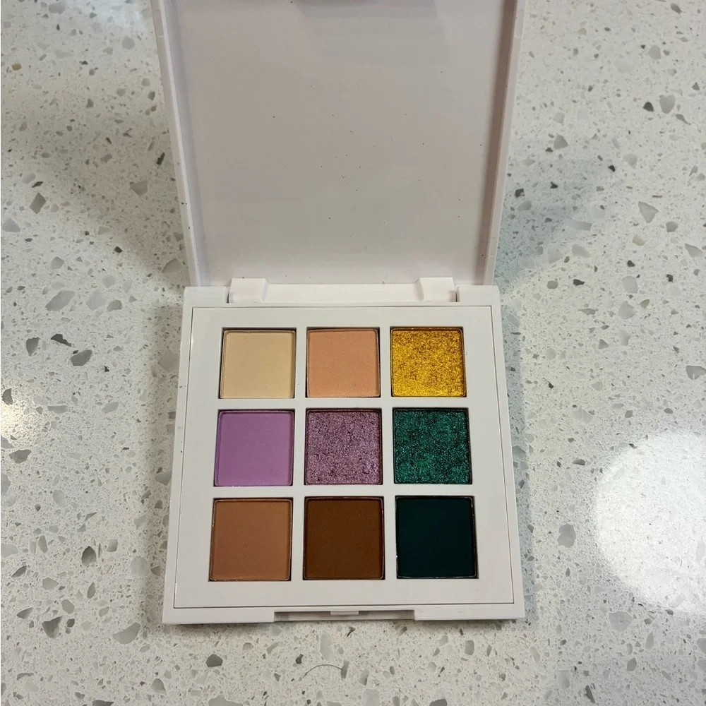 Just Ximena You & Me in Miami Eyeshadow Palette with Gold, Purple, and Teal Hues